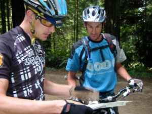 Brashears (l) and Klein (r) read the forest trail map.